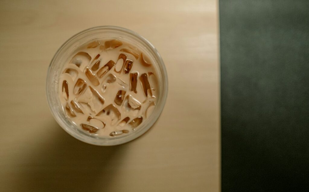 Illustrative iced latte, not a Caribou product photo