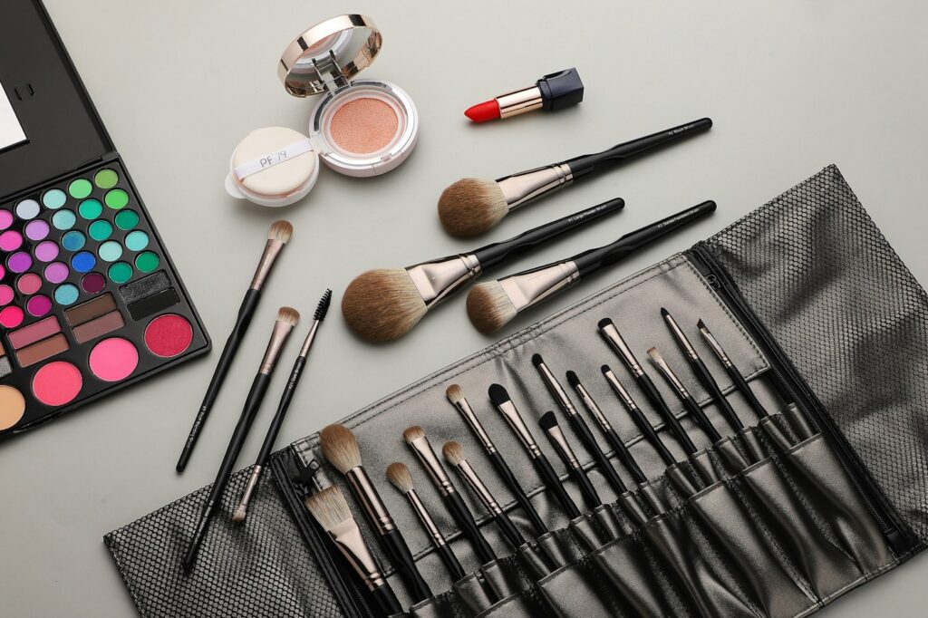 Makeup brushes arranged together, an illustration of brush shapes rather than either example kit