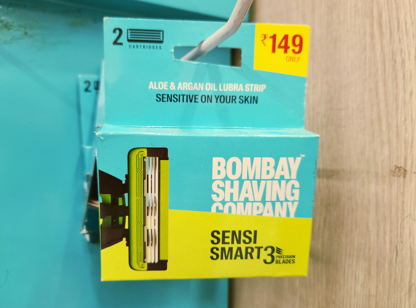 Illustrative shaving-cartridge package, not the Gillette products discussed