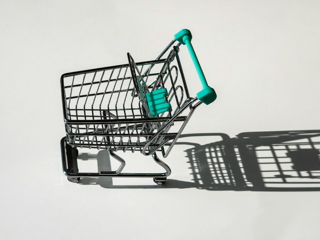 Bright shopping cart on a white background illustrating a Sam's Club Plus membership break-even calculation