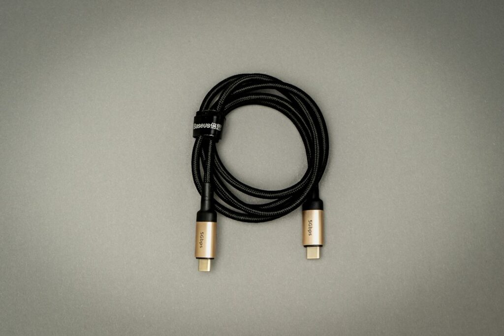 USB-C cable laid out to show its connectors; illustrative stock photograph