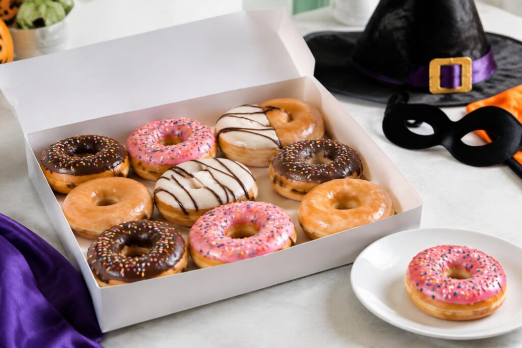 Krispy Kreme $13 Looney Tunes Lab Dozen & Free Doughnut for Costumed Guests — AI-generated illustrative scene