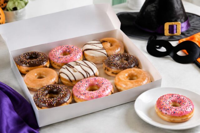 Krispy Kreme $13 Looney Tunes Lab Dozen & Free Doughnut for Costumed Guests — AI-generated illustrative scene