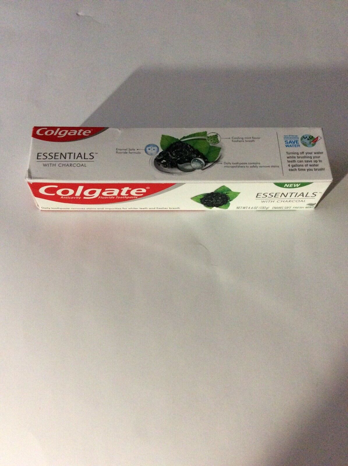 New Colgate Essentials with Charcoal fresh mint 4.6 oz